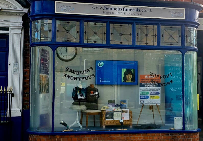 Grief and Gambling: Raising Awareness with Bennetts Funeral Directors Shop Window display